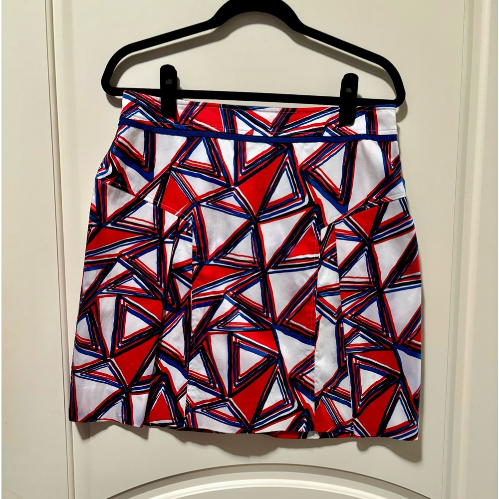 Etcetera skirt. Two pleads in the front. 97% cotton 3% spandex. Size 10